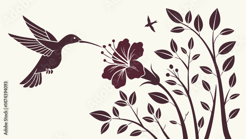 Hummingbird sipping nectar from flower silhouette