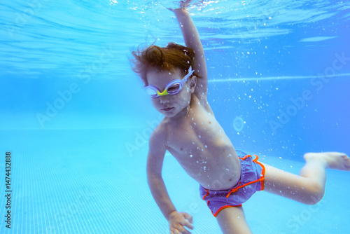 Underwater boy swimming