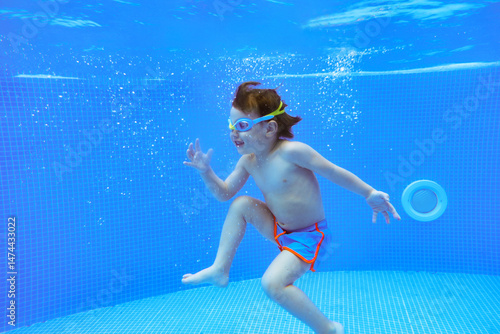 Underwater boy swimming