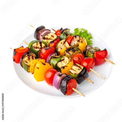 Delicious grilled vegetable skewers on white plate, vegetarian barbecue dish