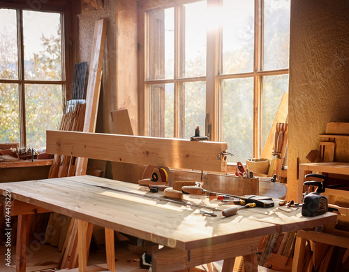sunlit workshop with wooden workbench and tools in rustic carpentry studio