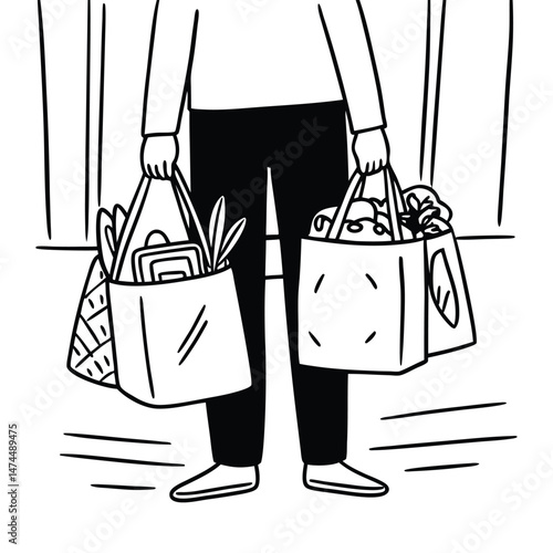 Man is holding two shopping bags in black and white