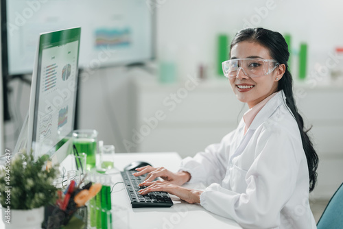 Scientists examining plant ...
