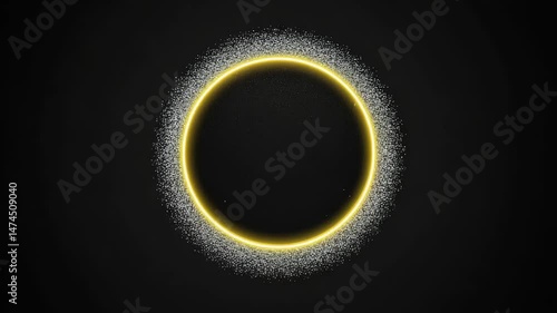 Bright yellow halo with glittering dust on a black backdrop, evoking an eclipse phenomenon