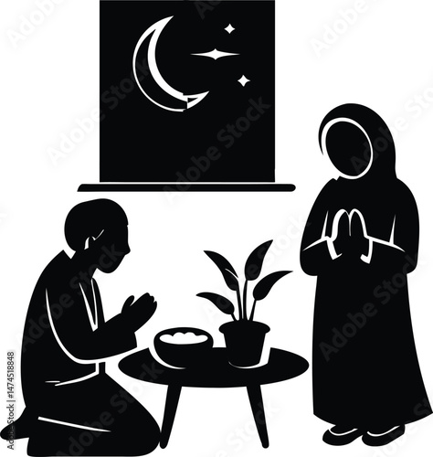 Muslim Couple Praying Together at Home During Ramadan