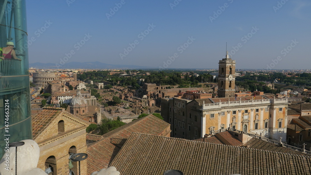 Obraz premium Stunning aerial view of the Roman Forum, Colosseum, and historic buildings. Perfect for travel, history, and architecture.
