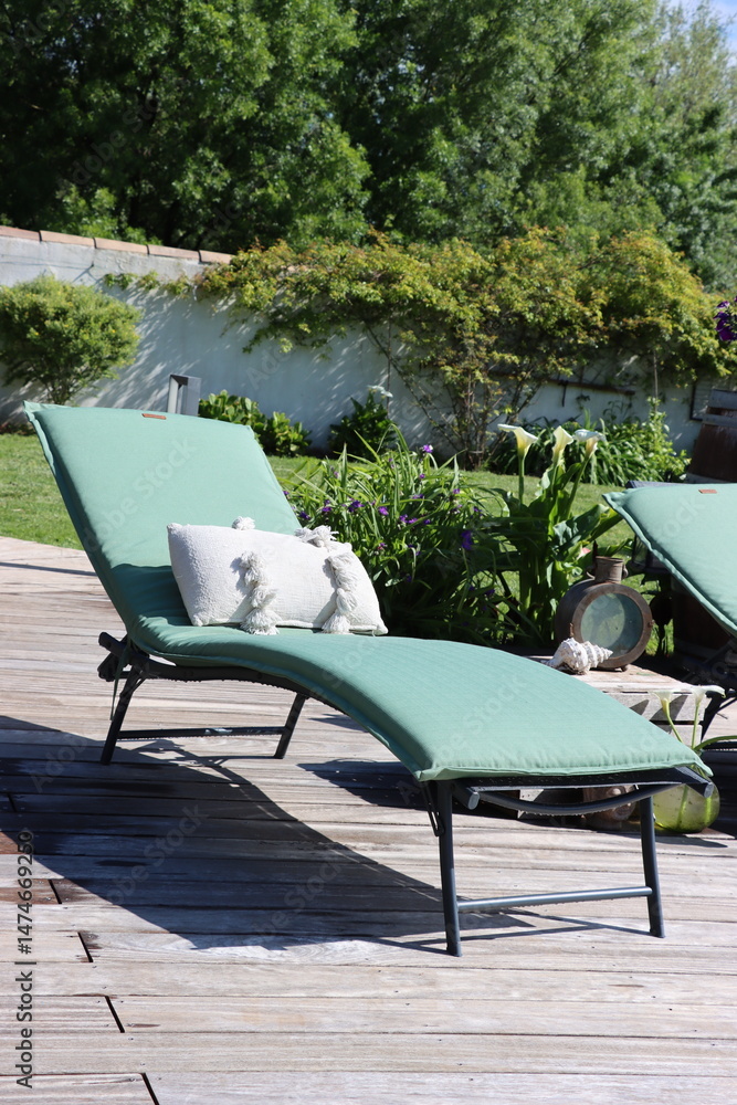 Obraz premium beach chair placed on a garden