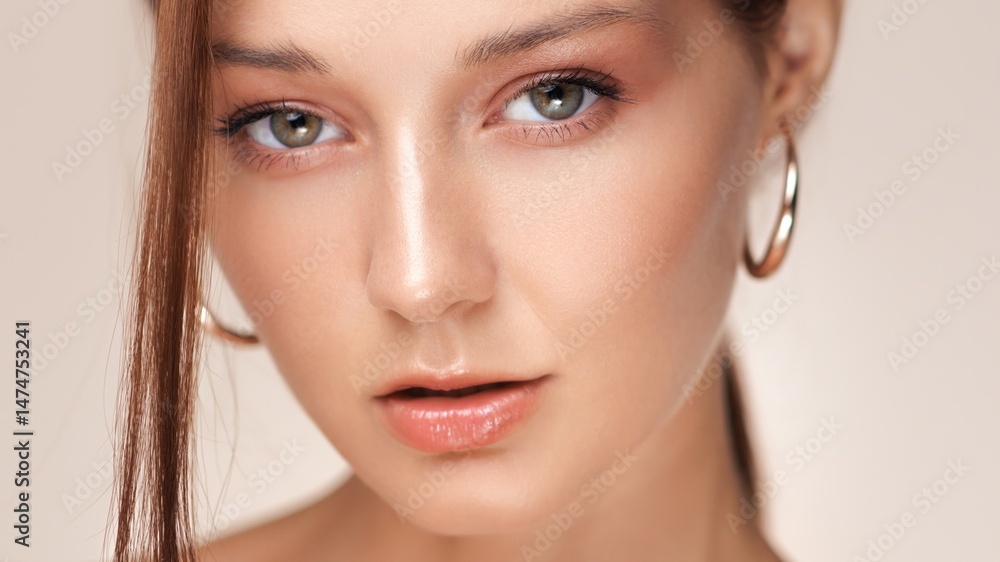 Closeup Of Woman With Glossy Lips And Radiant Skin In Beauty Concept Closeup Of Woman With Glossy Lips And Radiant Skin In Beauty Concept