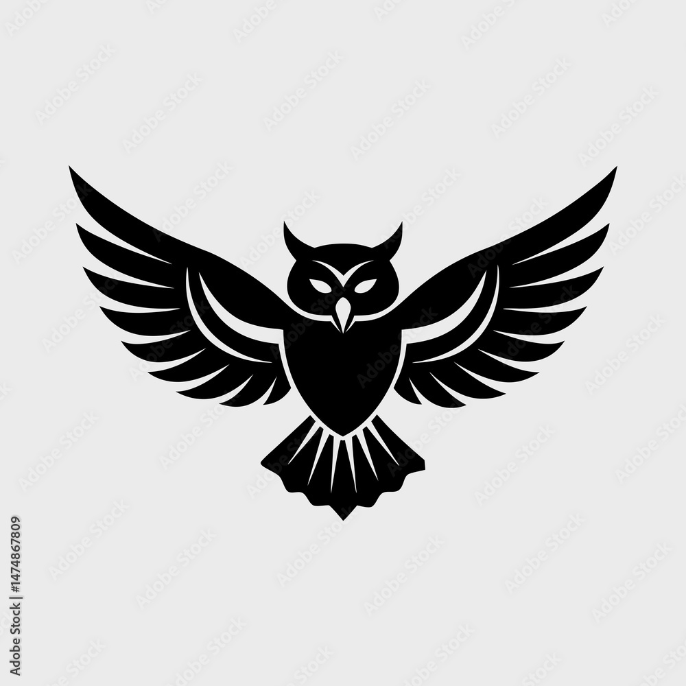 Obraz premium Simple Silhouette of an Owl in Flight Vector Illustration