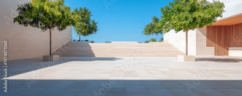 Architectural exterior with trees and staircase under clear sky modern building facade