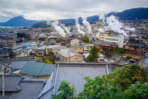 Townscape of Beppu with Onsen steam, famous for tourism as the hot spring town, Beppu, Oita, Kyushu, Japan