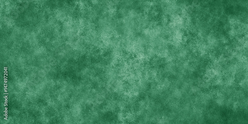 Abstract Elegant dark green background with mottled vintage texture in old fancy background design, texture of colored parchment paper.