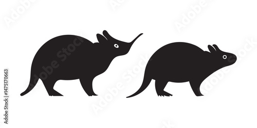 Set of two black and white silhouettes of armadillos