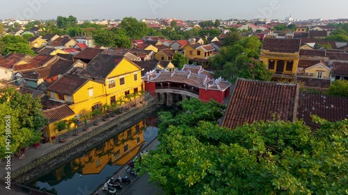 Aerial view of the Japanese Covered Bridge in Hoi An, Vietnam. Captures ancient architecture, tiled rooftops, and peaceful streets. Ideal for travel, tourism, culture, and heritage content
