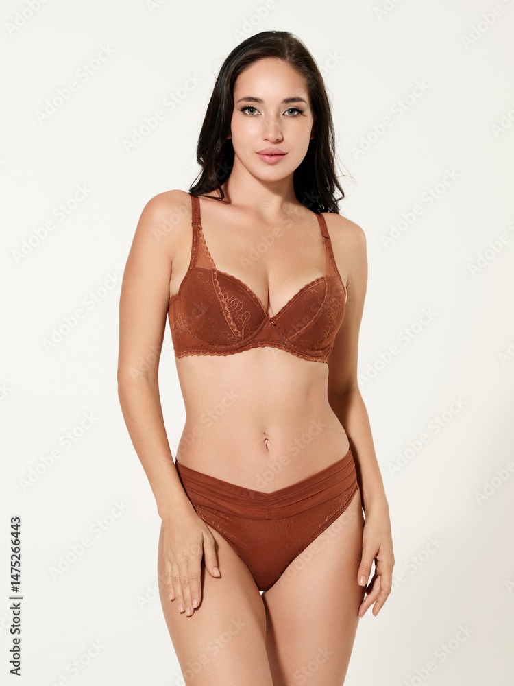 Sexy girl model in a beautiful swimsuit, fashion shooting in the studio. Sexy girl model in a beautiful swimsuit, fashion shooting in the studio.