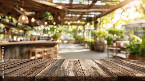 Wallpaper Mural Rustic wooden table foreground overlooking blurred outdoor restaurant patio with bar seating and green plants in natural light Torontodigital.ca