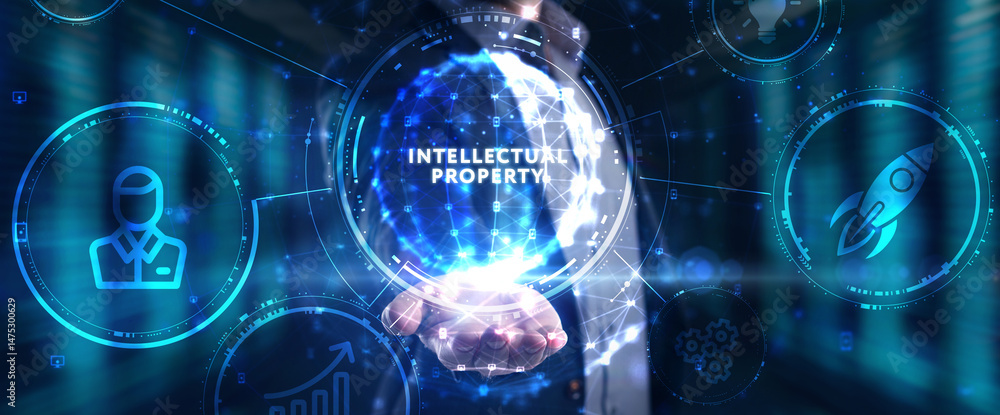 Fototapeta premium Business, technology, internet and network concept. Virtual screen of the future and sees the inscription: Intellectual property.