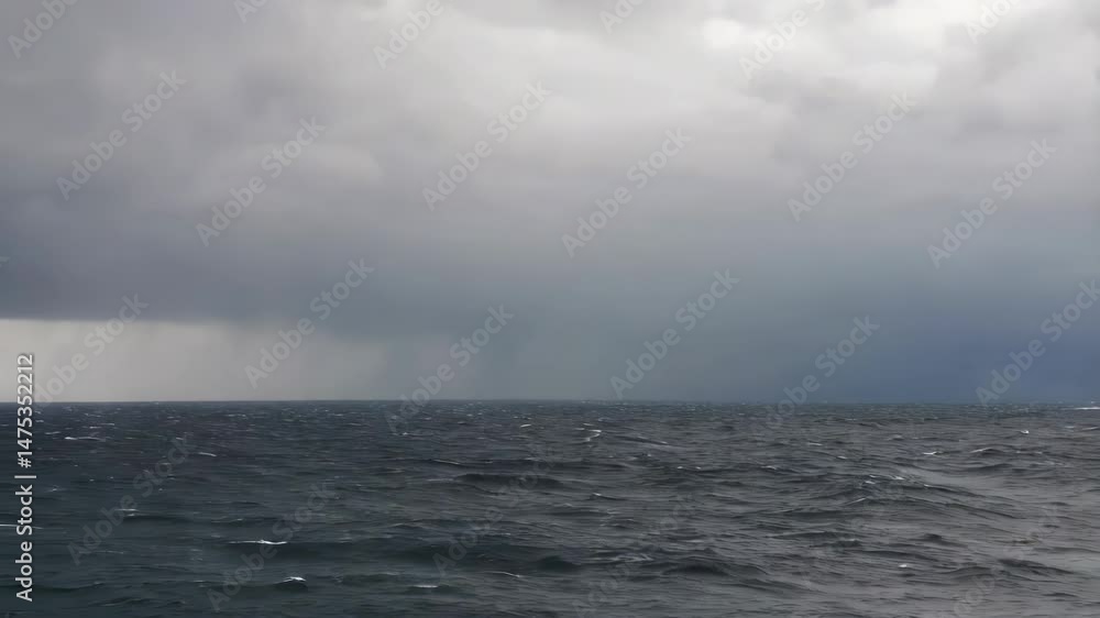 Stormy Sea with Dark Clouds and Rain Approaching Water Footage Stormy Sea with Dark Clouds and Rain Approaching Water Footage