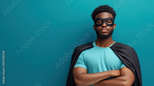 A Confident Black Man Poses As A Superhero