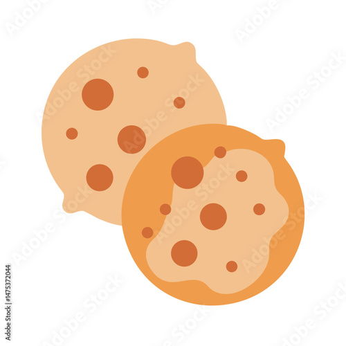 Two cookies or biscuits on a dark background