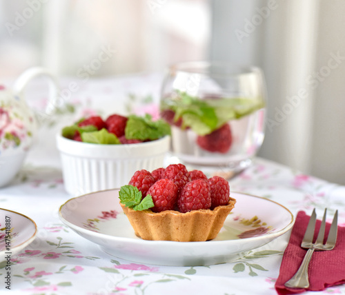 Mini tarts with raspberries