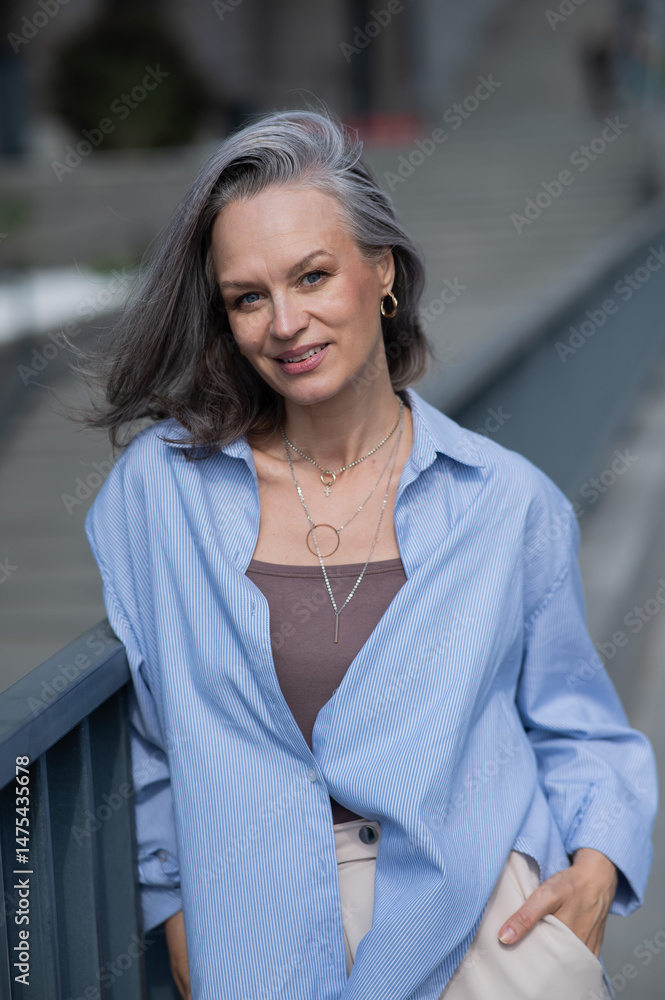 Fototapeta premium Portrait of a Caucasian mature woman with gray hair. 