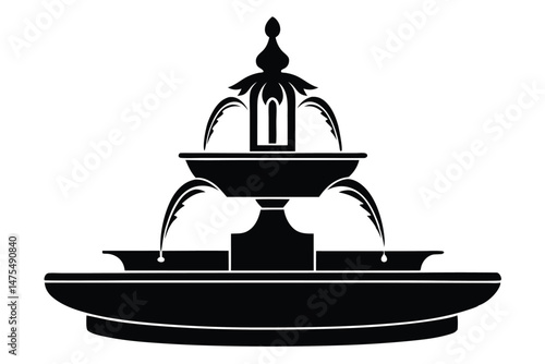 Black silhouette shows vintage multilevel fountain pouring water, creating a captivating display