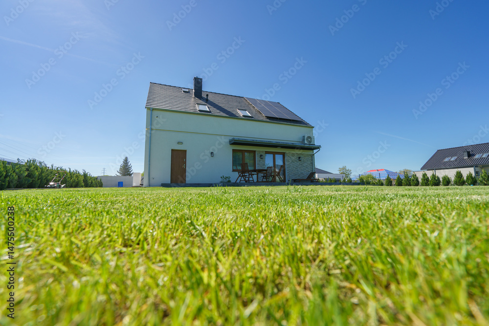 Rear of new build fully detached house with solar panels