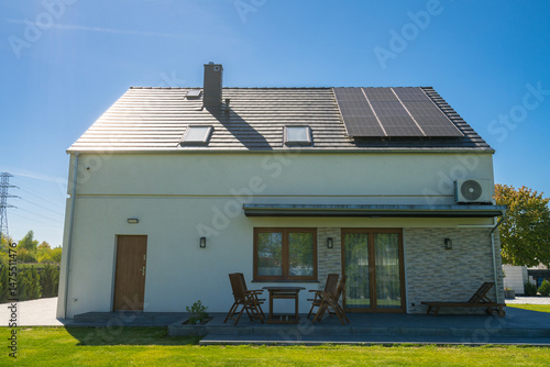 Rear of new build fully detached house with solar panels
