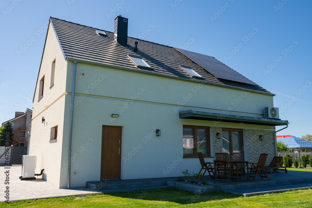 Rear of new build fully detached house with solar panels