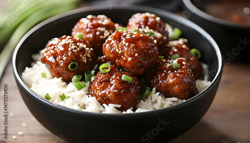 Tasty meatballs with sauce and rice on wooden table, closeup