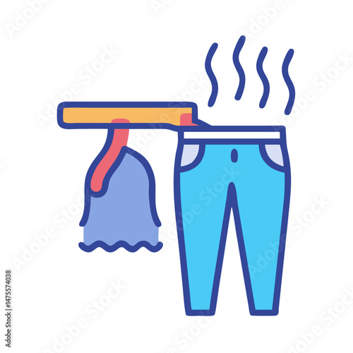 Steaming freshly ironed blue jeans on black background