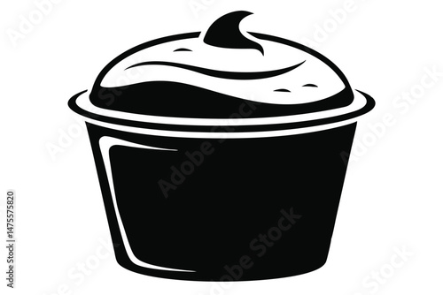 A cup of creamy, whipped soft ice cream rests beautifully in black silhouette