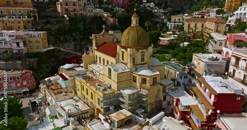 Aerial view of Positano. Marina Grande beach, town hall, Sant'Andrea duomo bell tower in Amalfi coast, Italy