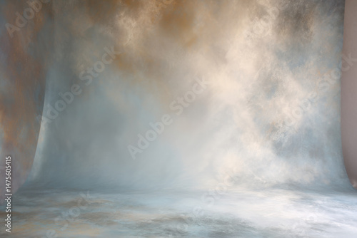 Light blue studio background. Muted golden tones. Canvas background on the wall and on the floor with a soft transition.
