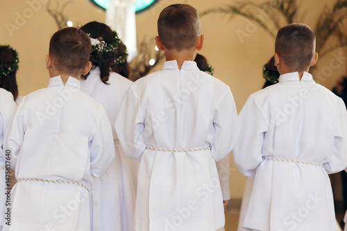 Boys in White Albs During First Holy Communion Mass Ceremony