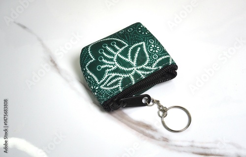 Handcrafted stone keychain with floral design