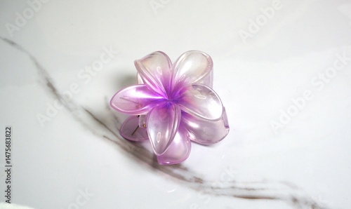 Purple Flower Hair Clip on White Background