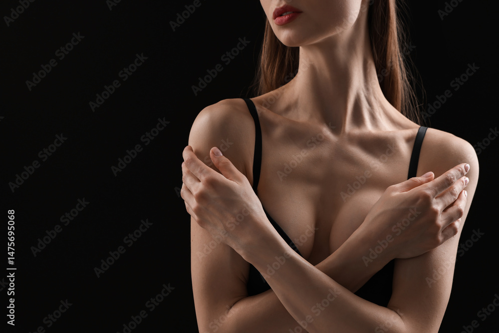 Fototapeta premium Woman with perfect skin on black background, closeup. Space for text