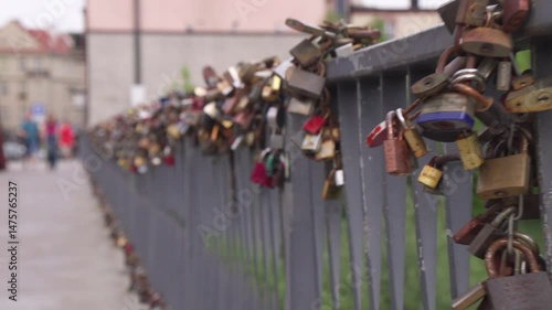 Love locks on a bridge in an urban setting