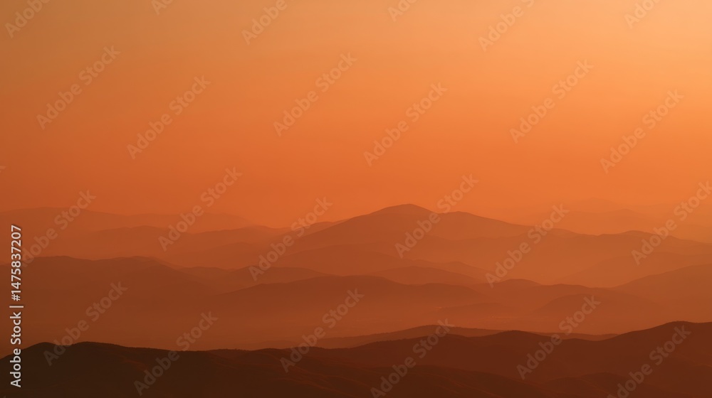 Serene Sunset Over Rolling Hills in Warm Orange Tones with Subtle Layers of Mountains in the Background Serene Sunset Over Rolling Hills in Warm Orange Tones with Subtle Layers of Mountains in the Background