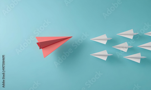 Wallpaper Mural A single coral paper airplane leads a formation of white planes against a light blue background, symbolizing innovation and leadership. Torontodigital.ca