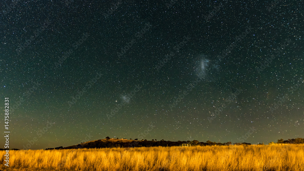 Fototapeta premium Stargazing at the night sky and Magellanic Clouds
