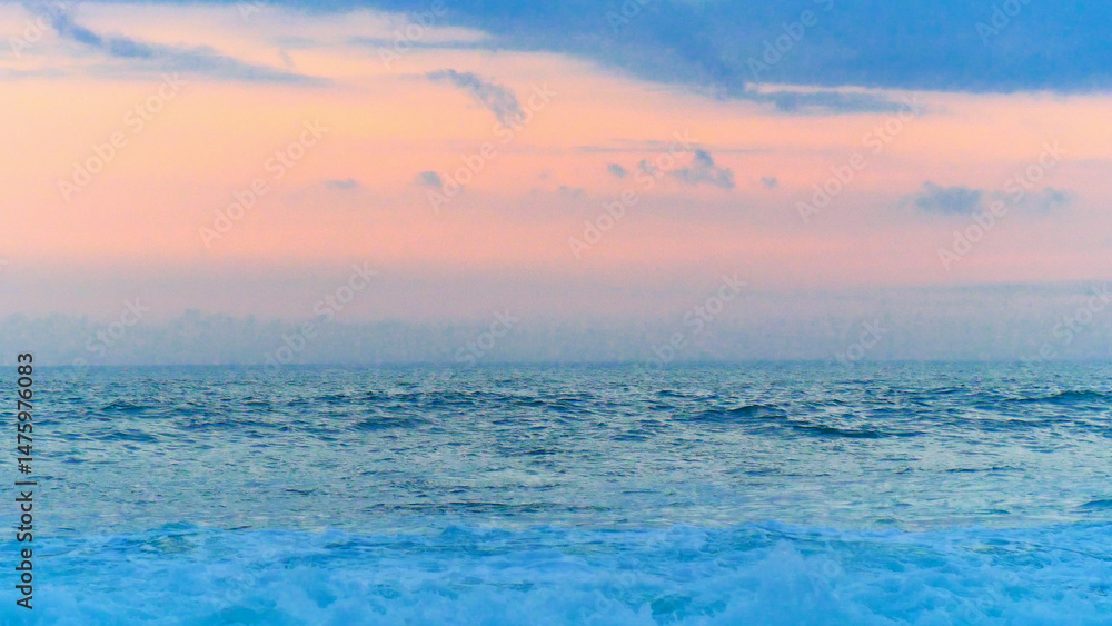 Obraz premium Tropical sea beach in summer time on sunny day. Golden sand beach sea peaceful scenery on the beach. Travel vacation seaside outdoor. Ocean island beautiful dramatic landscape. Sunny seascape scene.