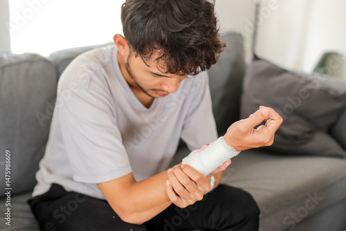 Young Man with Depression, Mental Health Or Anxiety Wearing Bandage After Suicide Attempt