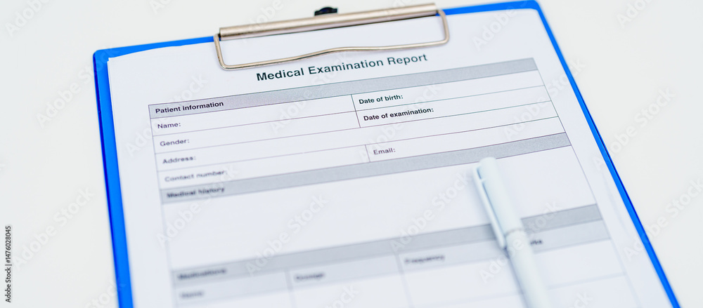medical examination report form on blue clipboard with white pen of doctor. healthcare documentation, medical records, medical consulting, health checkup and examination concepts medical examination report form on blue clipboard with white pen of doctor. healthcare documentation, medical records, medical consulting, health checkup and examination concepts