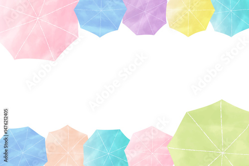 上から見た水彩タッチの傘が並ぶおしゃれな横型の背景フレーム