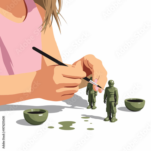 Young girl painting toy soldier with fine brush, creative expression