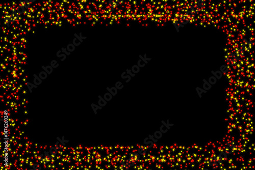 A black background framed with red and yellow star shaped particles creating a festive border effect