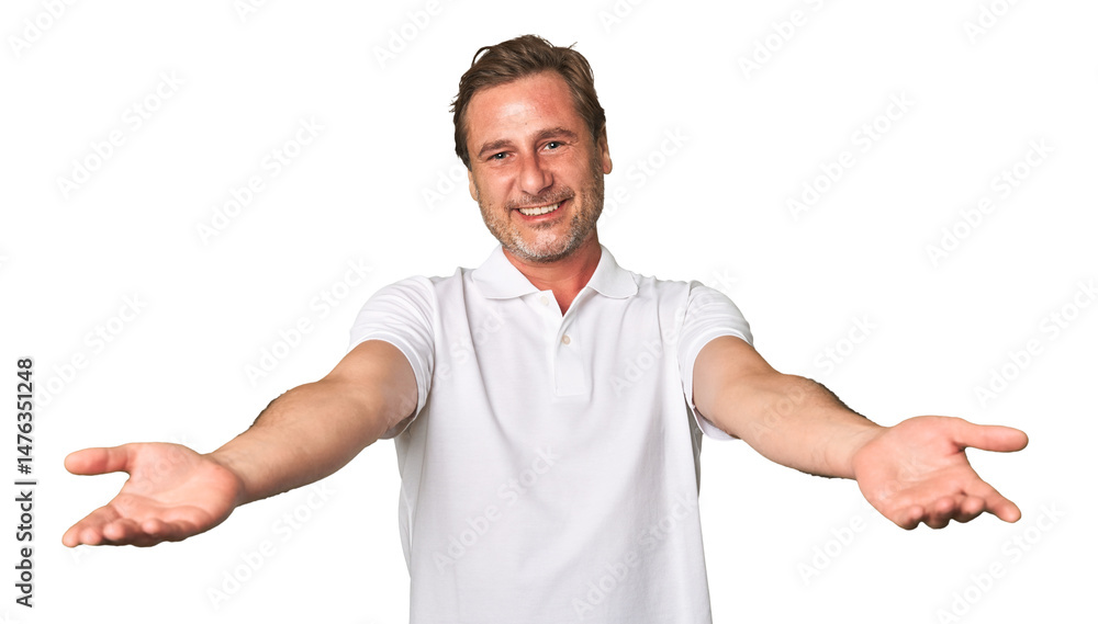 A middle-aged man isolated showing a welcome expression. A middle-aged man isolated showing a welcome expression.